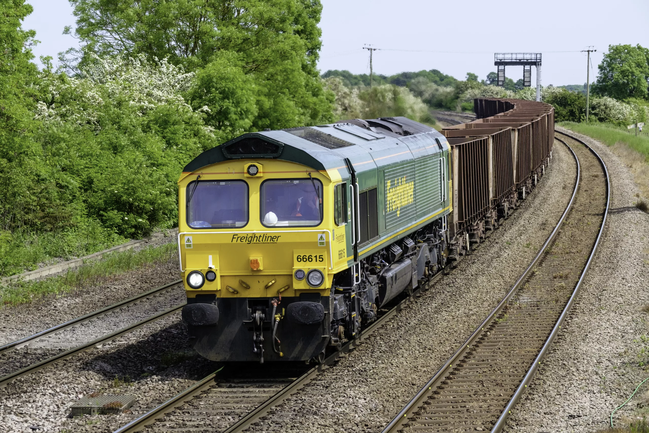 Freightliner class 66 loco hauling bulk solutions.